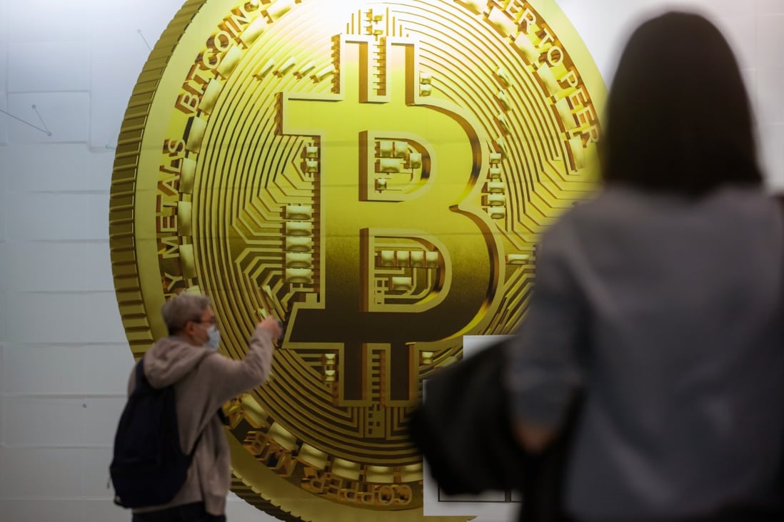 A Bitcoin advertisement at an MTR station in Hong Kong. NFTs are expected to become more popular in the city because of a large number of metaverse entrepreneurs who live here. Photo: Bloomberg