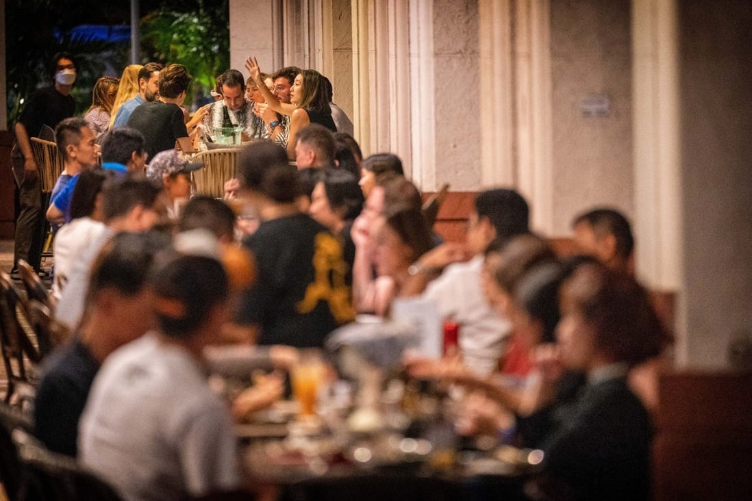 Customers at a restaurant in Robertson Quay in Singapore. Photo: Bloomberg