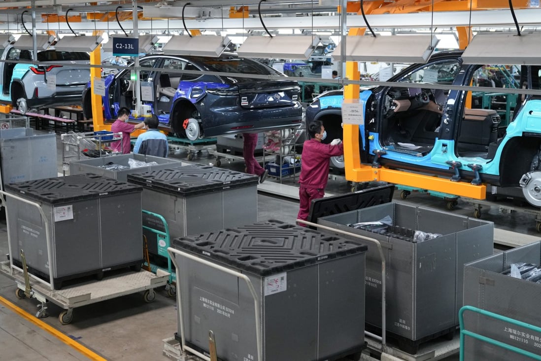 Technicians work on a vehicle production line at the NIO manufacturing base in Hefei, Anhui province. Photo: Xinhua