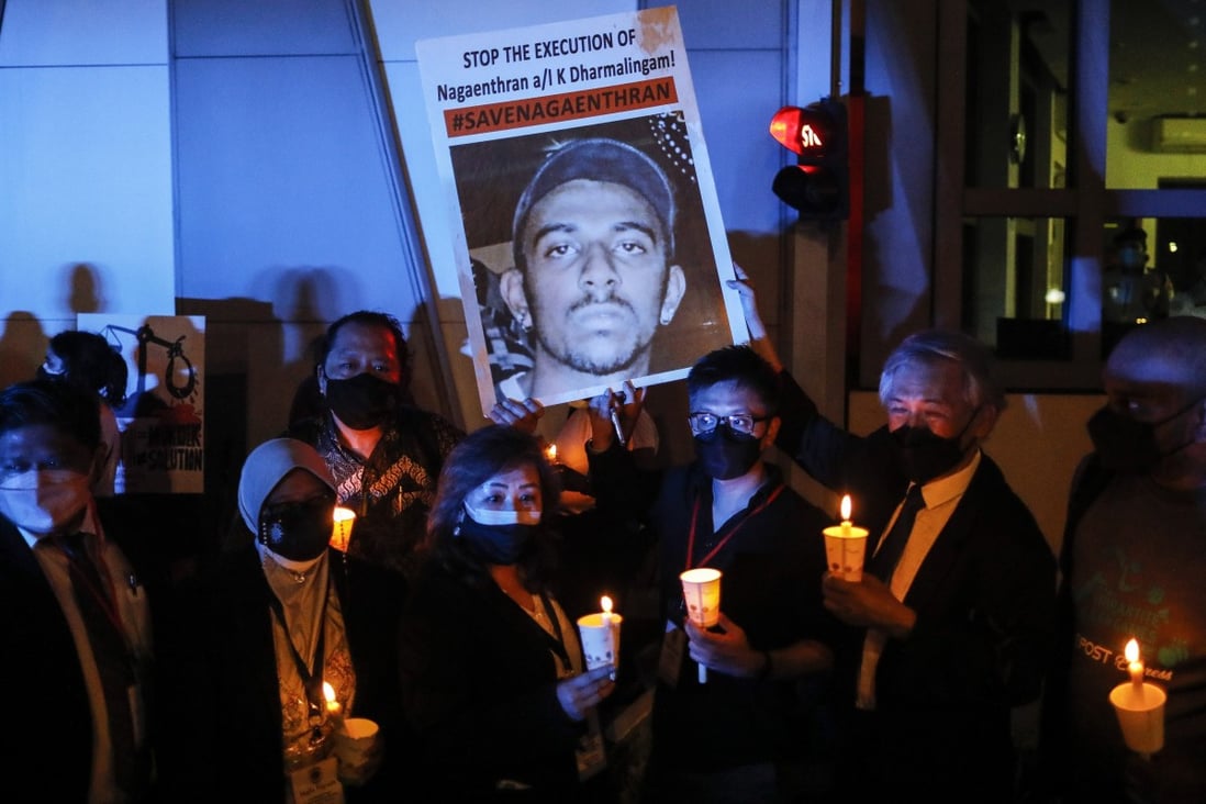 Activists hold a candlelight vigil on Tuesday night against the death penalty for Malaysian national Nagaenthran K. Dharmalingam outside Singapore’s embassy in Kuala Lumpur, Malaysia. Photo: EPA-EFE Activists hold a candlelight vigil on Tuesday night against the death penalty for Malaysian national Nagaenthran K. Dharmalingam outside Singapore’s embassy in Kuala Lumpur, Malaysia. Photo: EPA-EFE