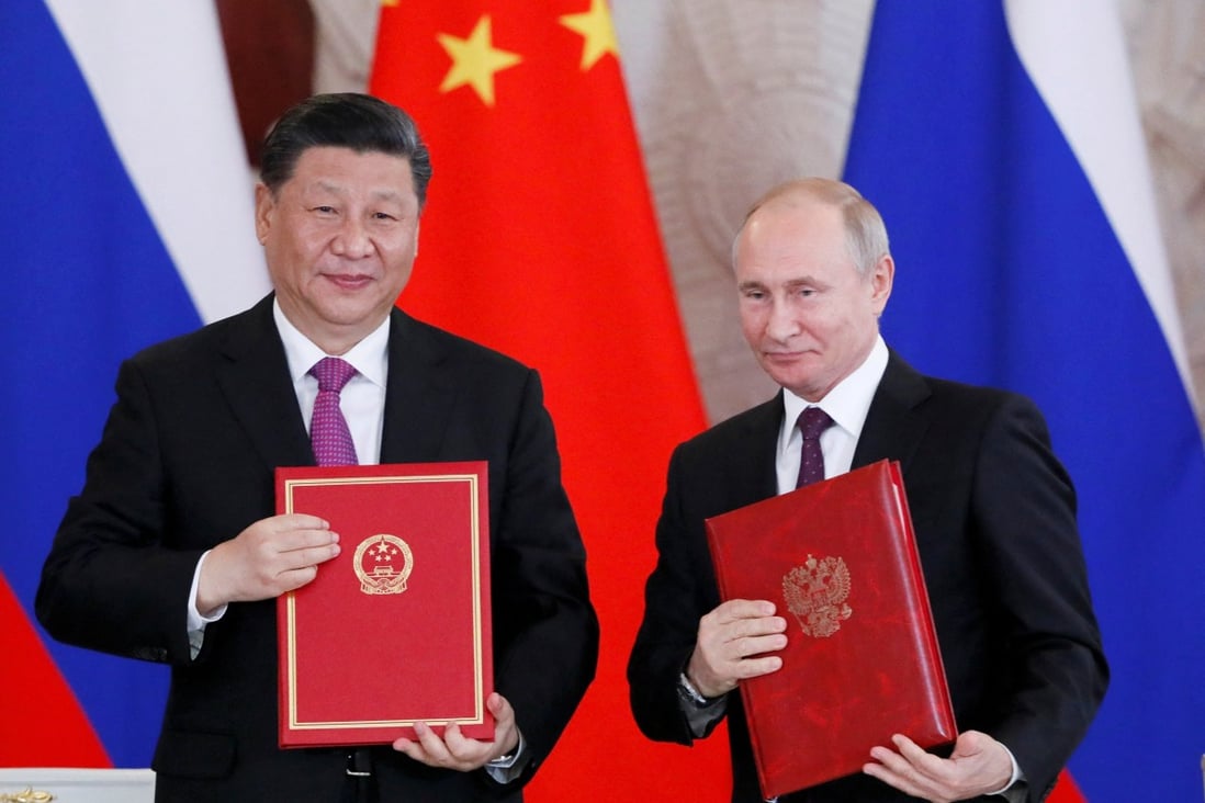 Russian and Chinese Presidents Vladimir Putin and Xi Jinping pose after a signing ceremony in Moscow on June 5, 2019. Photo: Reuters
