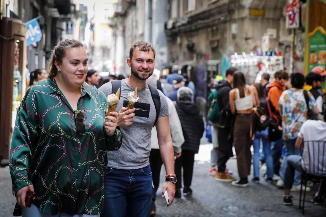 People in Naples, southern Italy on the day when new Covid-19 rules came into force. Photo: EPA-EFE