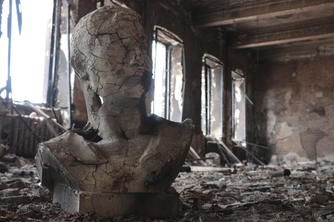 A destroyed bust can be seen in a hall at the Museum of Local Lore that burned down after shelling in an area controlled by Russian-backed separatist forces in Mariupol, eastern Ukraine, on April 28. Photo: AP