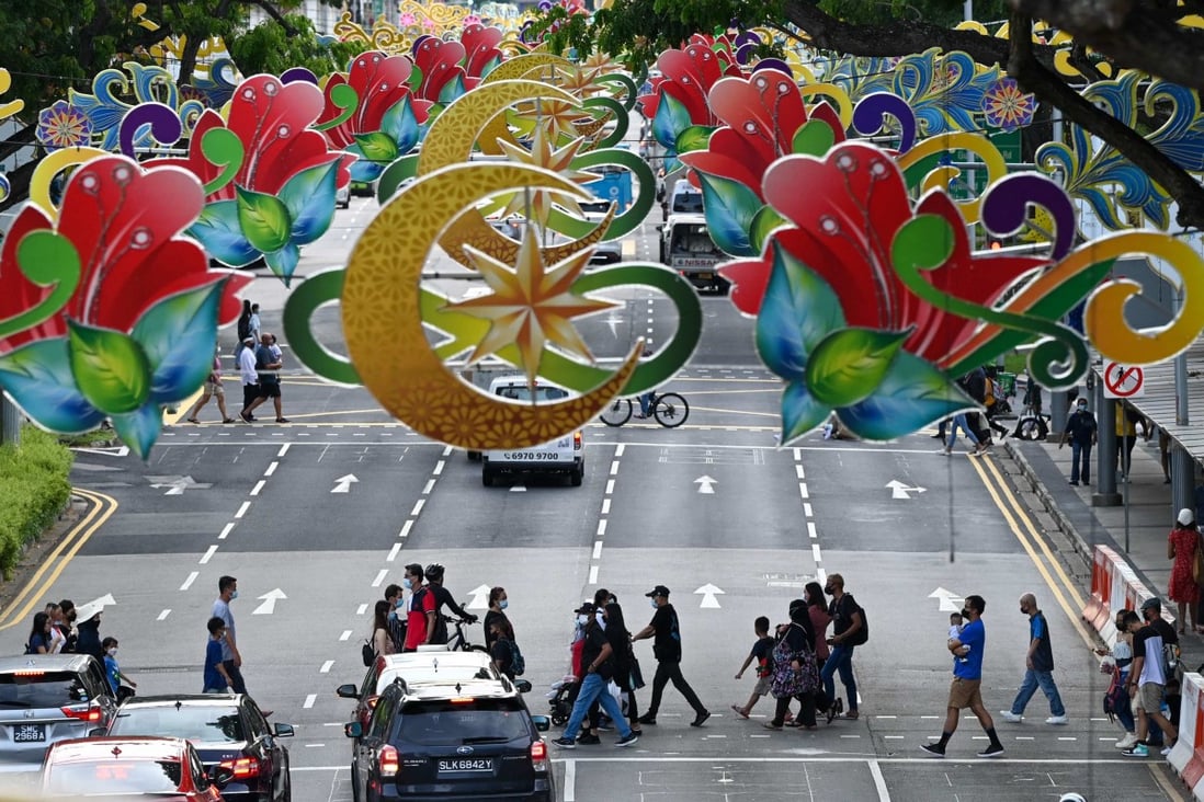 Decorations hang over a street in Singapore to celebrate Eid al-Fitr, or Hari Raya Aidilfitri, which marks the end of the Muslim fasting month of Ramadan. Photo: AFP