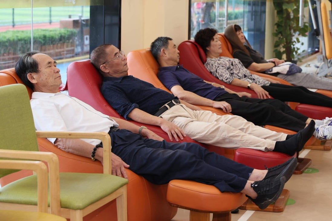 People relax on massage sofas at a senior care centre in Shanghai. File photo: Xinhua