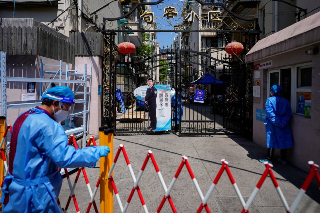 The entrance of a residential area is closed off during a lockdown in Shanghai on May 5. Lockdowns in major Chinese cities are just one of several factors weighing on sentiment towards the Chinese economy and equities. Photo: Reuters