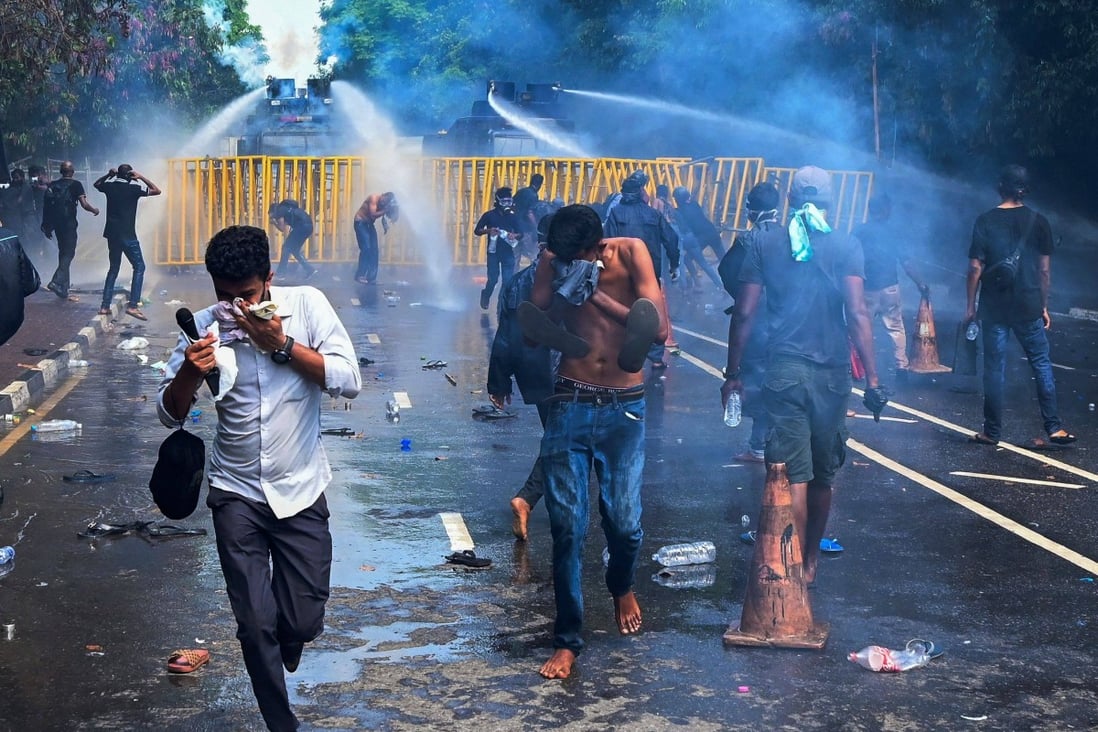 Police use a water canon and tear gas to disperse university students protesting to demand the resignation of Sri Lanka’s President Gotabaya Rajapaksa over the country’s crippling economic crisis, near the parliament building in Colombo. Photo: AFP
