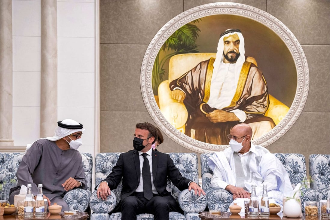 France’s President Emmanuel Macron, centre, and Mauritania’s President Mohamed Ould Ghazouani, right, offer their condolences to Sheikh Mohamed bin Zayed al-Nahyan, President of the UAE and Ruler of Abu Dhabi, at Mushrif Palace in Abu Dhabi on May 15. Photo: Ministry of Presidential Affairs - Abu Dhabi / AFP