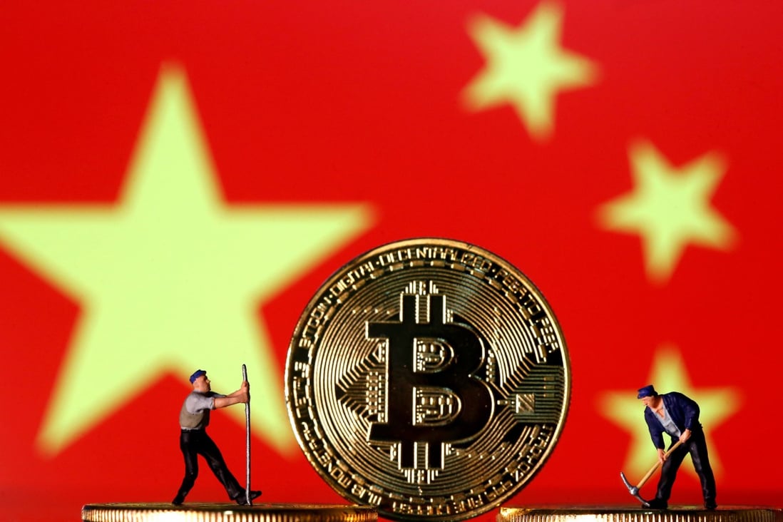 Small toy figurines seen on representations of the cryptocurrency bitcoin in front of an image of China’s flag in this illustration picture on April 9, 2019. Photo: Reuters