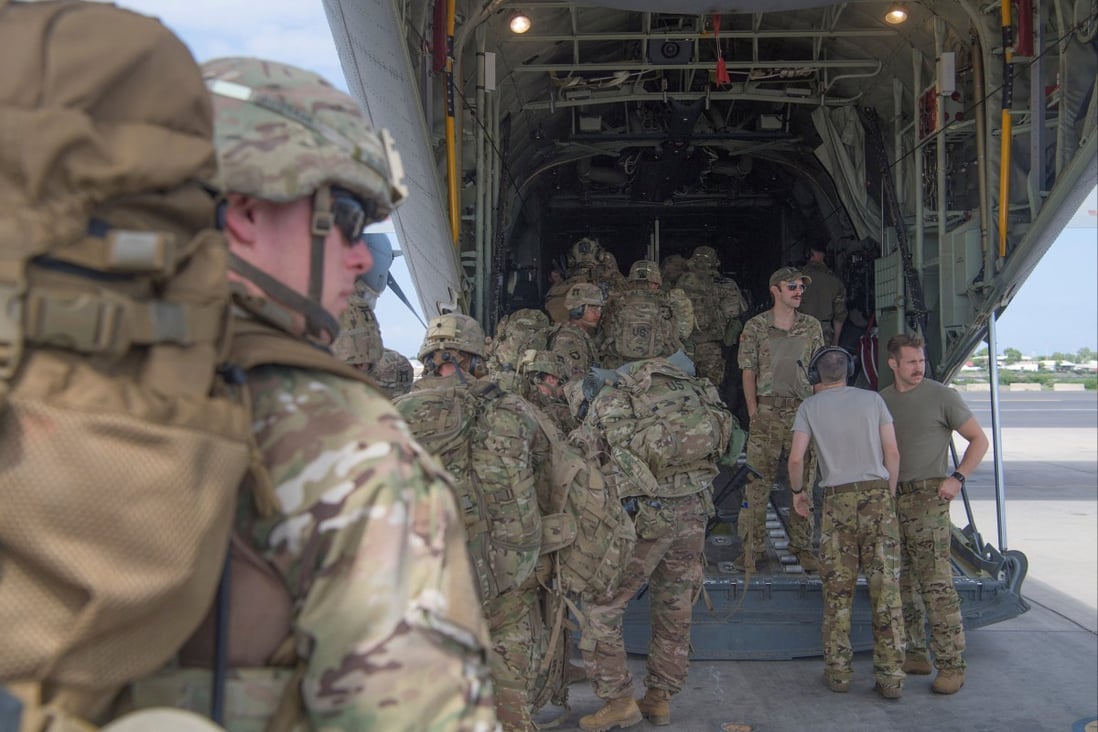 US Army soldiers assigned to the East Africa Response Force (EARF) board a transport plane in Camp Lemonnier, Djibouti in January 2020. Photo: US Air Force via Reuters