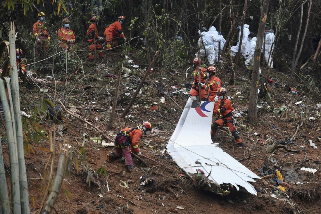 Workers search through debris at the China Eastern flight crash site in Tengxian County in southern China’s Guangxi Zhuang Autonomous Region in March. Photo: Xinhua via AP