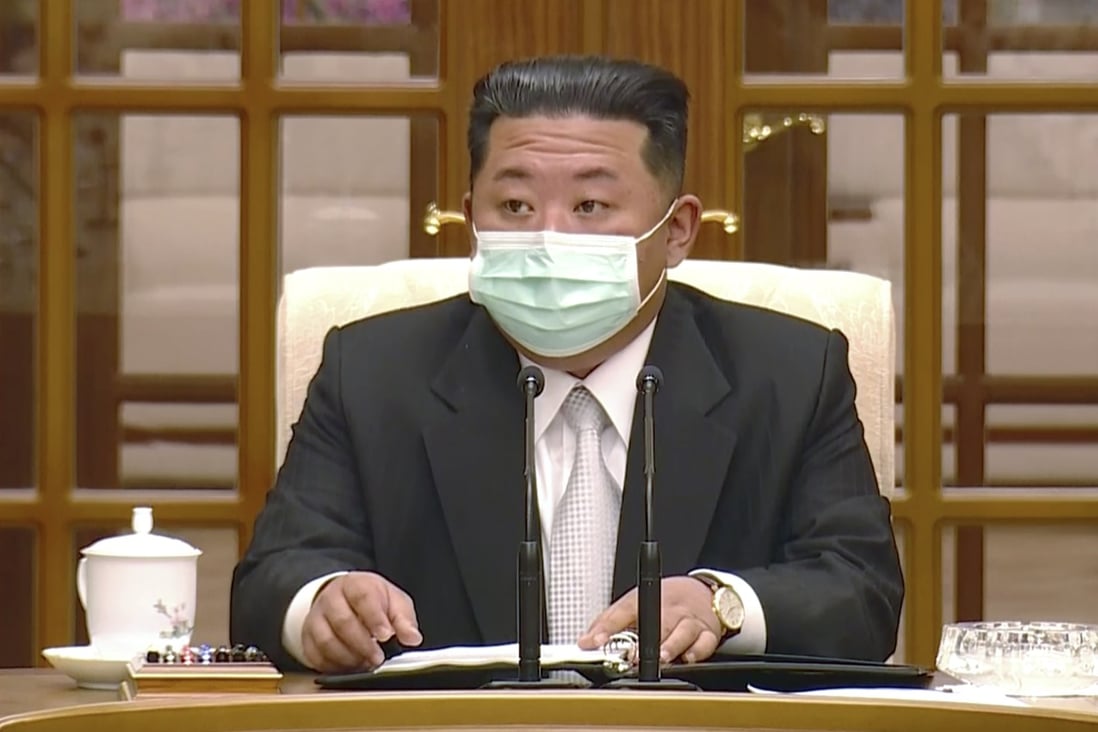 Kim Jong-un wears a face mask as he announces the country’s first acknowledged Covid-19 cases on May 12, 2022. Photo: KRT via AP 