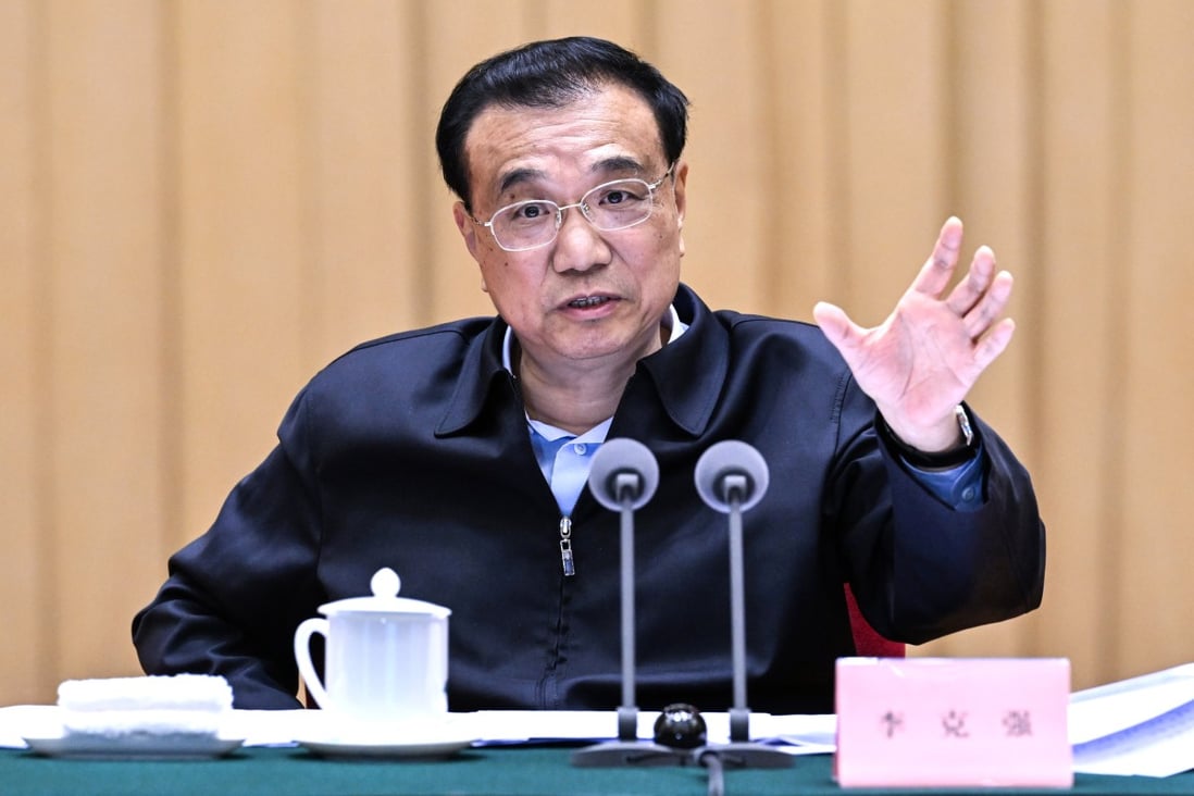 During a visit to Yunnan, Chinese Premier Li Keqiang, pictured without a mask,  stressed the Covid-hit economy needed urgent support. Photo: Xinhua