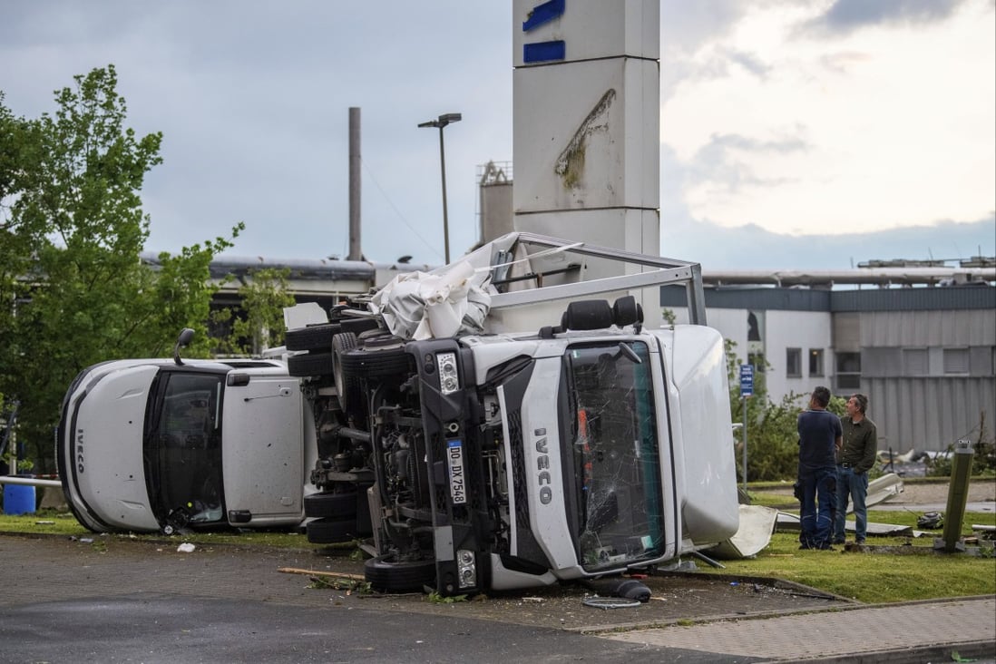 Two trucks were overturned by the storm in Paderborn, Germany on Friday. Photo: dpa via AP