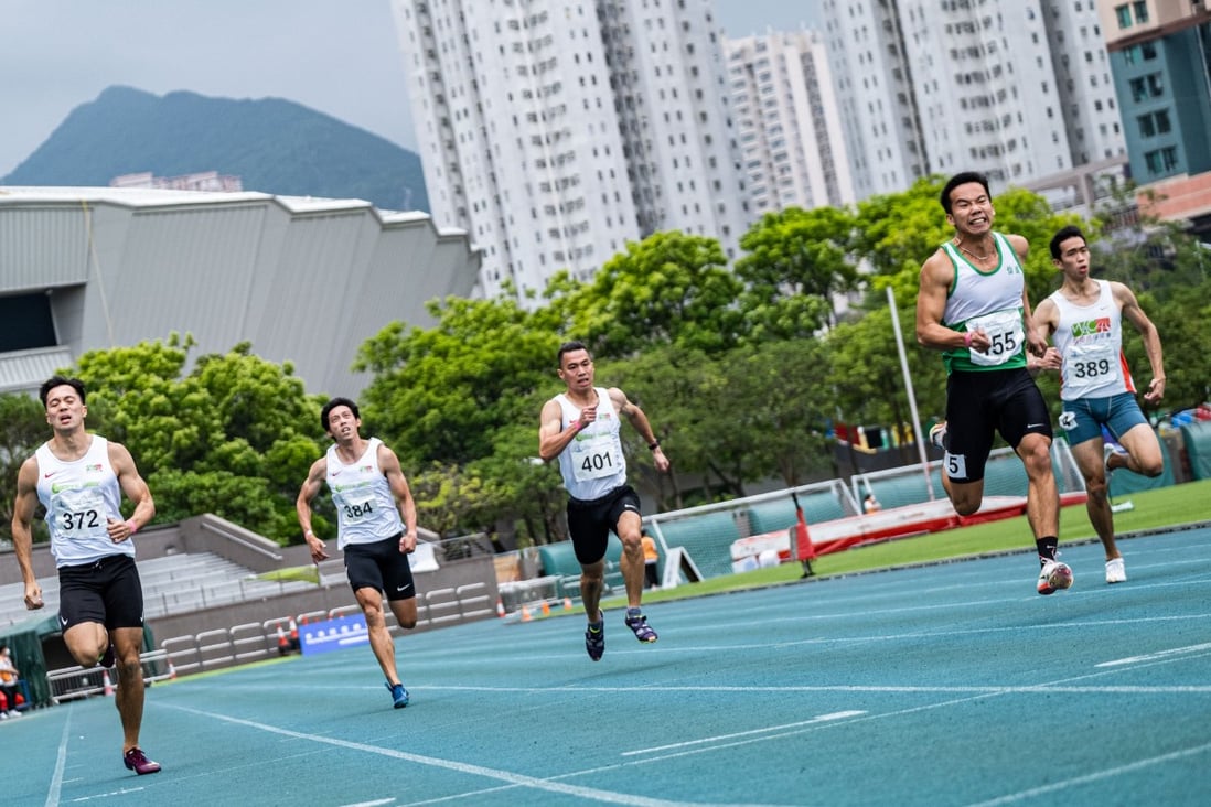 Leung San-lok wins the 200 metres in 21.63 seconds with Ng Ka-fung (right) in third place. Photo: HKAAA
