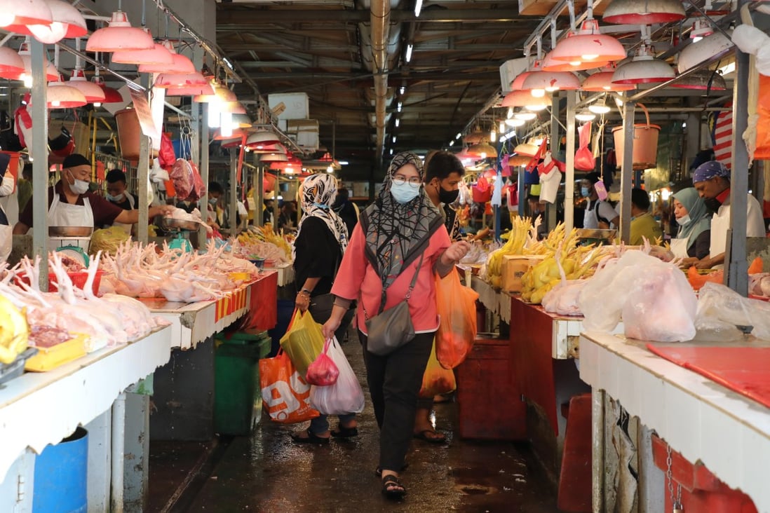 Shoppers in a food market in Kuala Lumpur, Malaysia. File photo: Reuters