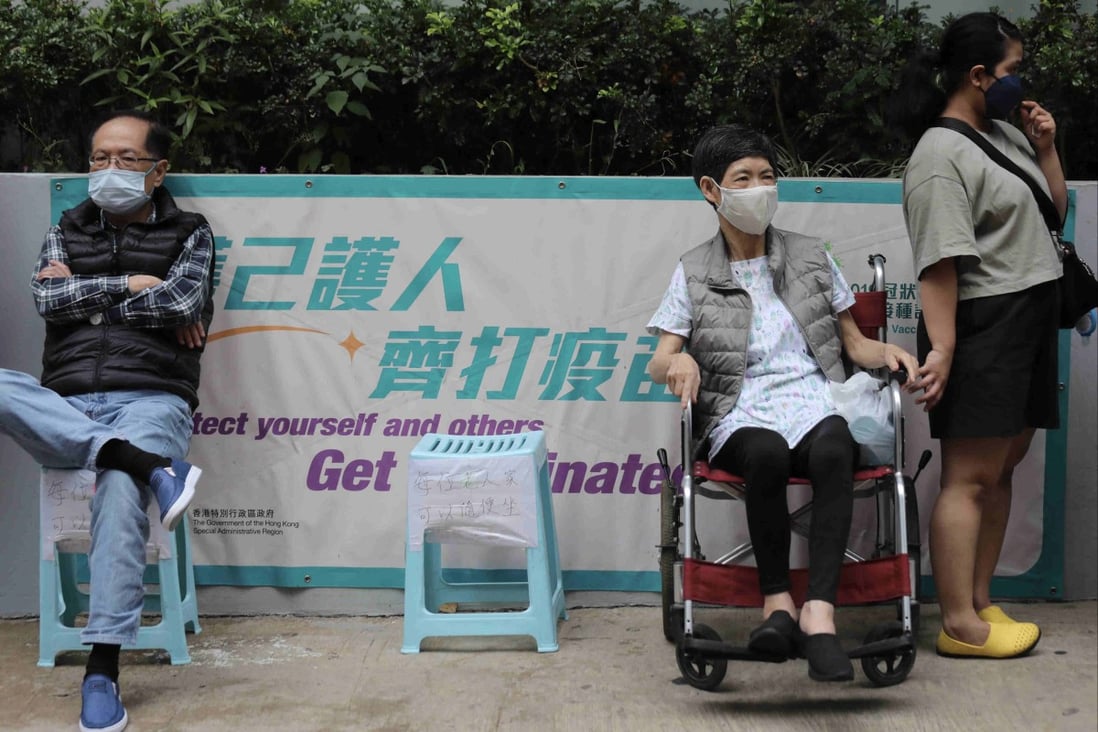 People wait to have Sinovac Covid-19 vaccine jabs outside Kwun Chung Sports Center in Yau Ma Tei on May 2. Photo: Xiaomei Chen