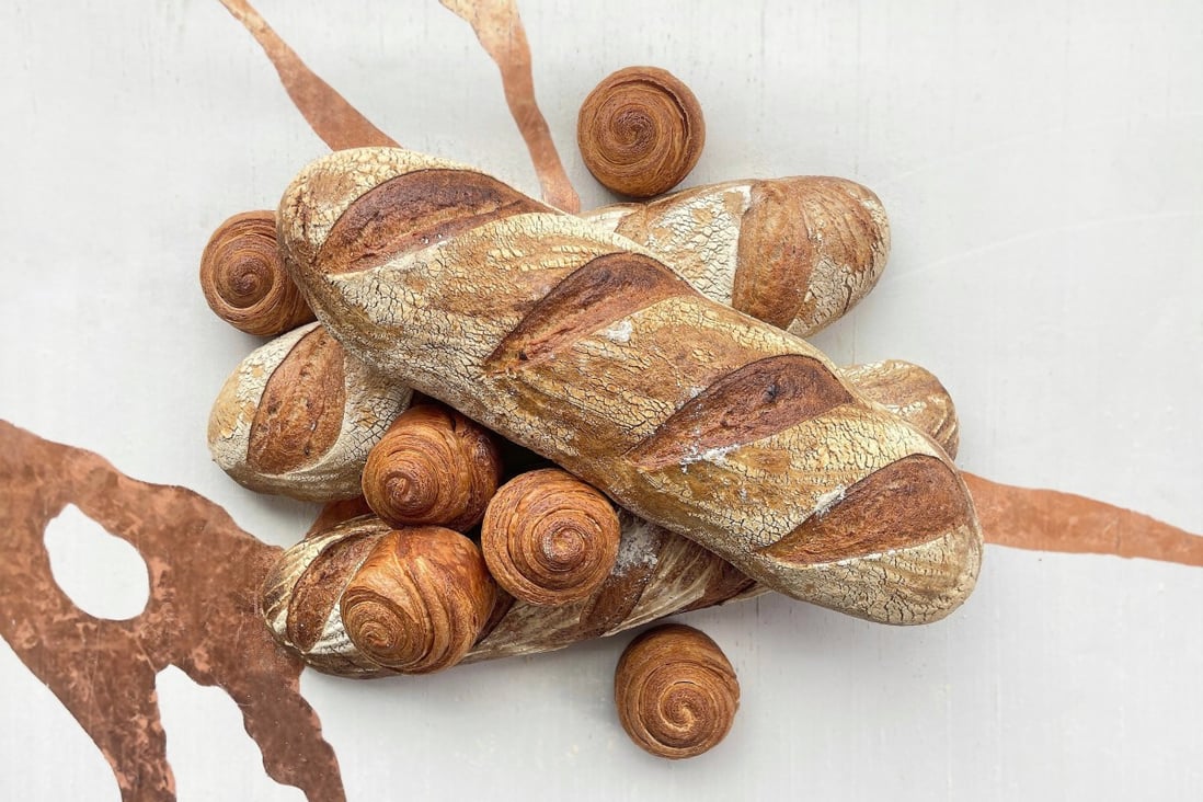 Sourdough bread and homemade brioche feuillete at Écriture, one of 11 restaurants on our list of the best bread baskets in Hong Kong. Photo: Écriture
