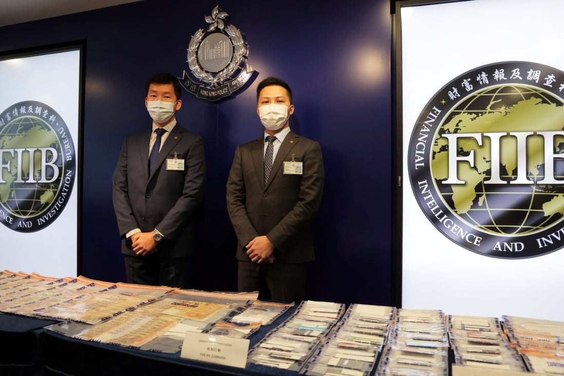 Chief Inspector Cheng Sze-wai and Senior Inspector Chan Hok-lun at a press conference displaying the evidence. Photo: Jelly Tse