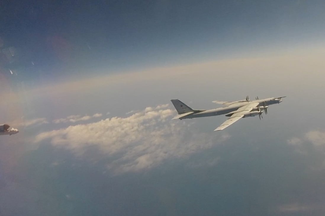 A Russian Tu-95 strategic bomber flies during Russian-Chinese military aerial exercises to patrol the Asia-Pacific regionin this still image taken from a video released on May 24, 2022. Photo: Russian Defence Ministry