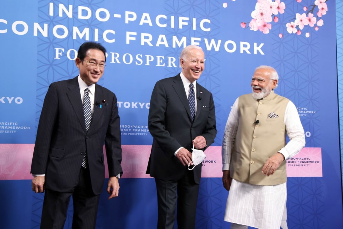(L-R) Japanese Prime Minister Fumio Kishida, US President Joe Biden and Indian Prime Minister Narendra Modi smile during a photo session at the launch of the Indo-Pacific Economic Framework (IPEF) in Tokyo on May 23. Pool photo: EPA-EFE 