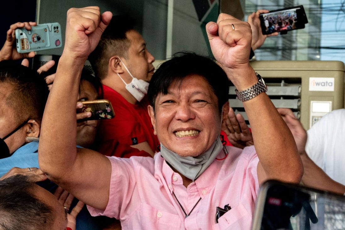 Ferdinand “Bongbong” Marcos Jr., son of late dictator Ferdinand Marcos, greets his supporters at his headquarters in Mandaluyong City, Metro Manila, Philippines after his presidential election victory. Photo: Reuters