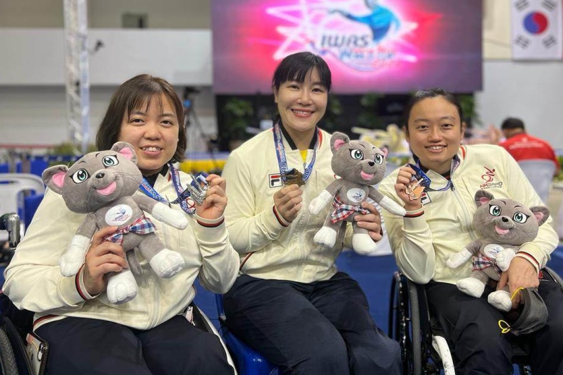 Hong Kong’s Alison Yu (centre), Irene Chung (left), and Chan Yui-chong (right) pose with their medals in Thailand. Photos: Handout