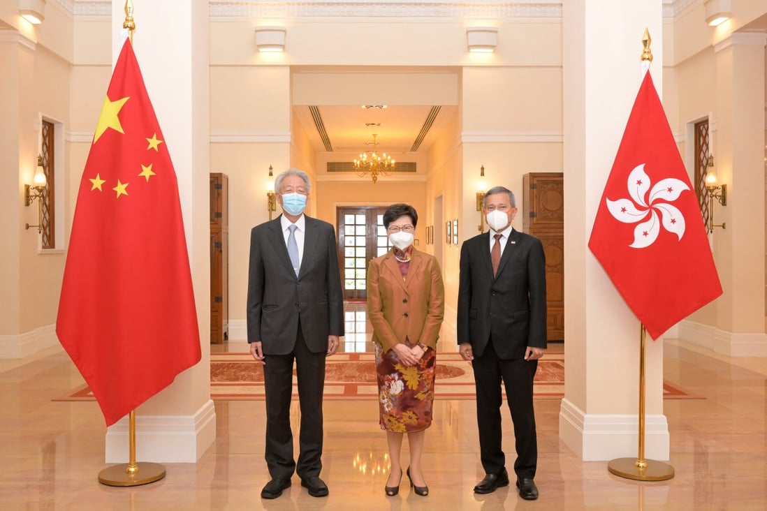 Singapore’s Senior Minister and Coordinating Minister for National Security Teo Chee Hean (left) and Minister for Foreign Affairs Vivian Balakrishnan meet with Hong Kong Chief Executive Carrie Lam at Government House on May 30. Photo: Handout