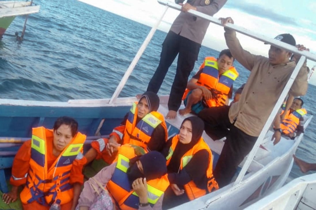 Thirty-one people have been rescued and 11 are still missing after a ferry ran out of fuel and sank in bad weather off the coast of Indonesia. Photo: Indonesia Search and Rescue Handout/AFP