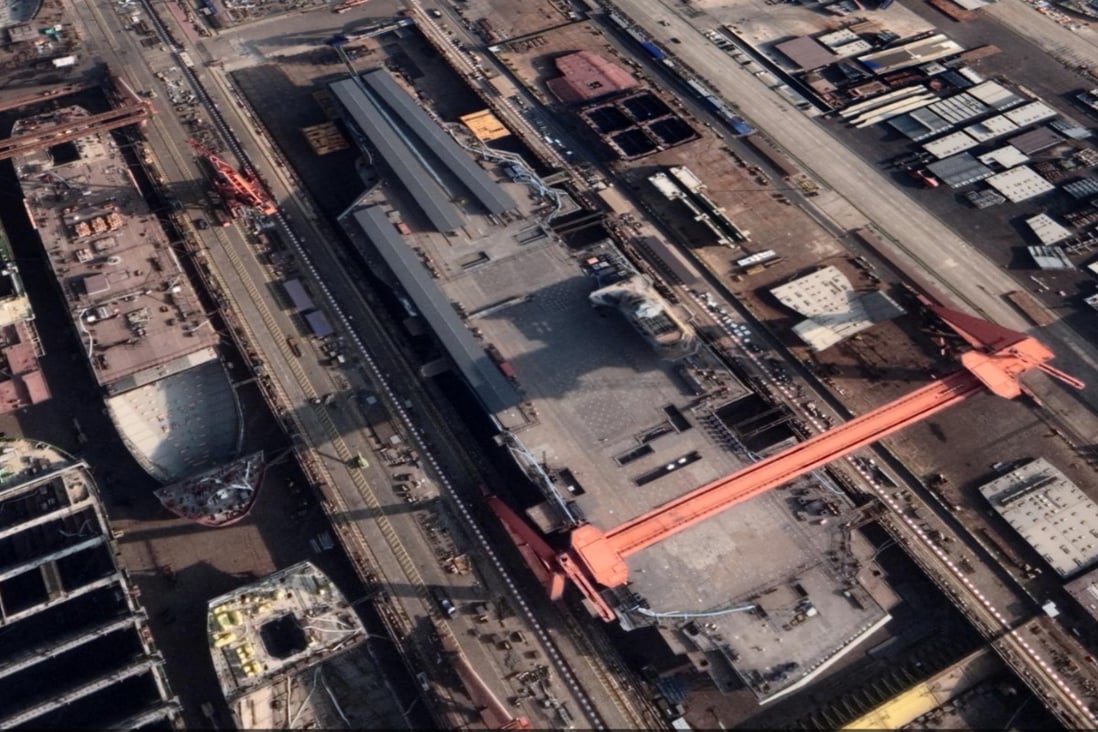 Recent satellite imagery shows construction work on the aircraft carrier has almost been completed. Photo: Google Earth