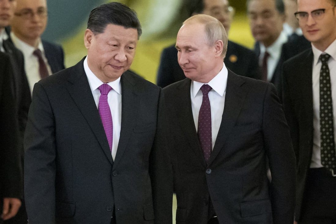 President Xi Jinping (left) and Russian President Vladimir Putin enter a hall for talks in the Kremlin in Moscow on June 5, 2019. The Sino-Russian relationship has come under increased scrutiny as China faces accusations of supporting Moscow despite declaring a ‘neutral’ stance. Photo: AP