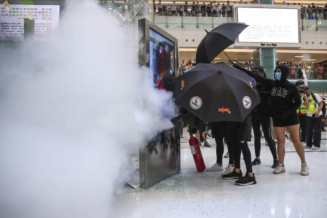 Protesters destroy MTR facilities at New Town Plaza in Sha Tin in 2019. Photo: Sam Tsang