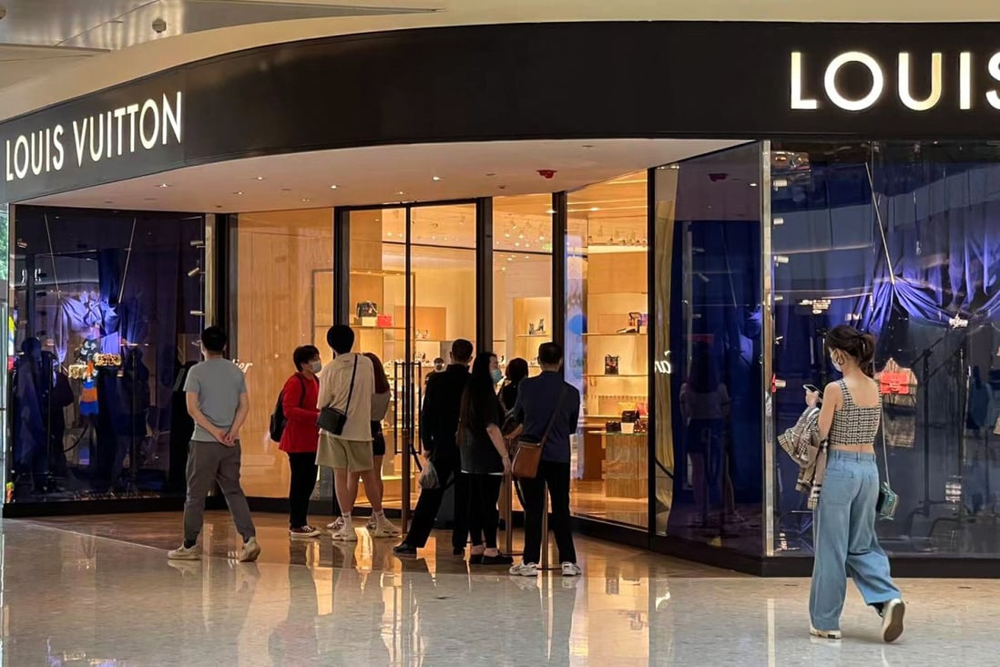 Shanghai residents are seen lining up outside a Louis Vuitton boutique inside Sun Hung Kai Properties’ Shanghai IFC mall on June 1, 2022. Photo: Handout