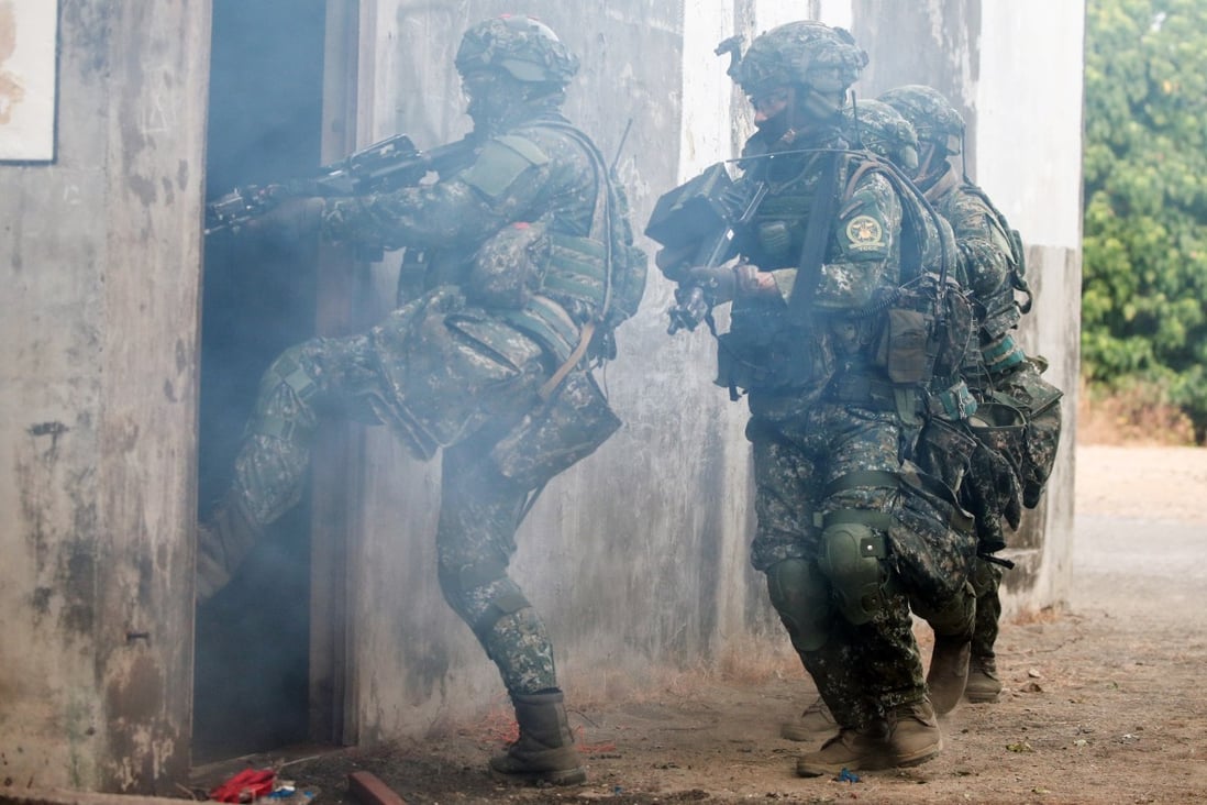 Taiwanese soldiers take part in a training exercise featuring a simulated attack from the Chinese mainland. Photo: Bloomberg