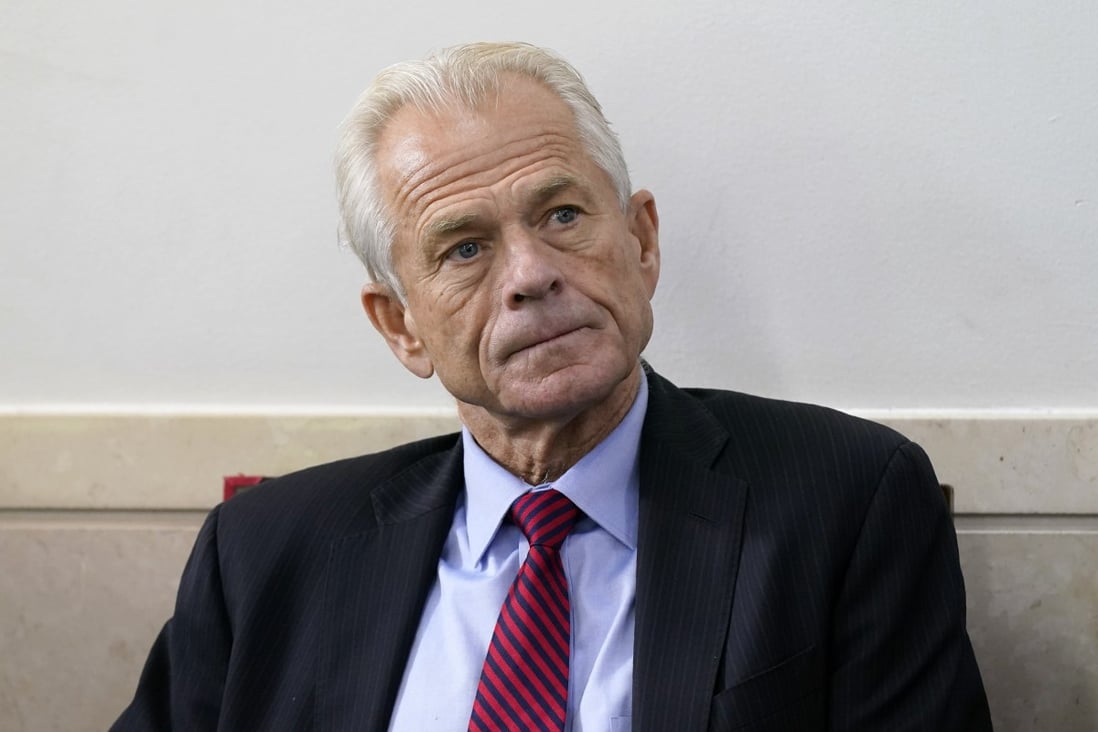 White House trade adviser Peter Navarro listens as President Donald Trump speaks during a news conference at the White House in August 2020. Photo: AP