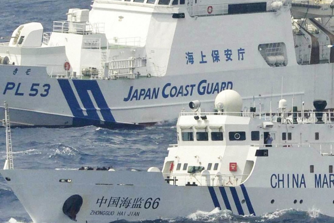 A Chinese surveillance vessel and a Japanese coastguard ship. File photo: via Getty Images