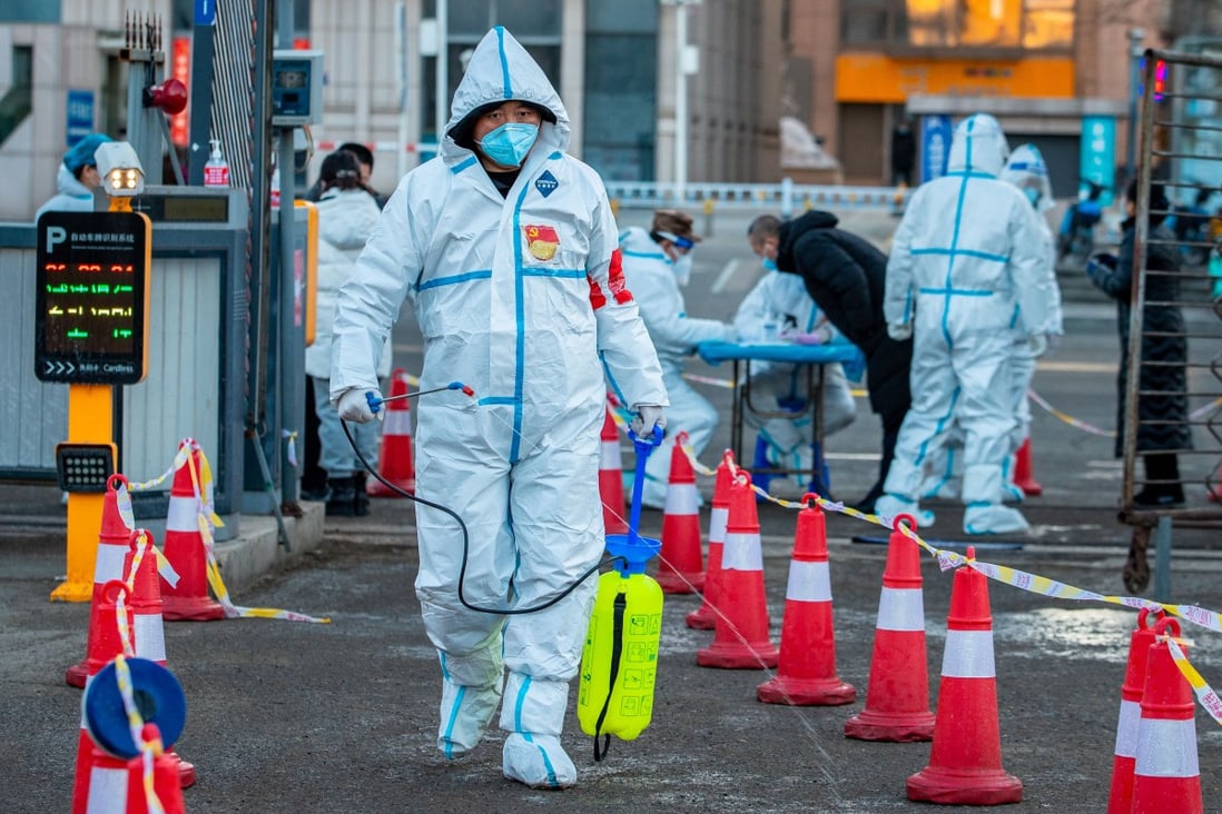 Volunteers disinfect a temporary Covid-19 testing site in Hohhot, Inner Mongolia, in late February 23. The region has been struck by a number of outbreaks this year. Photo: Costfoto/Future Publishing via Getty Images