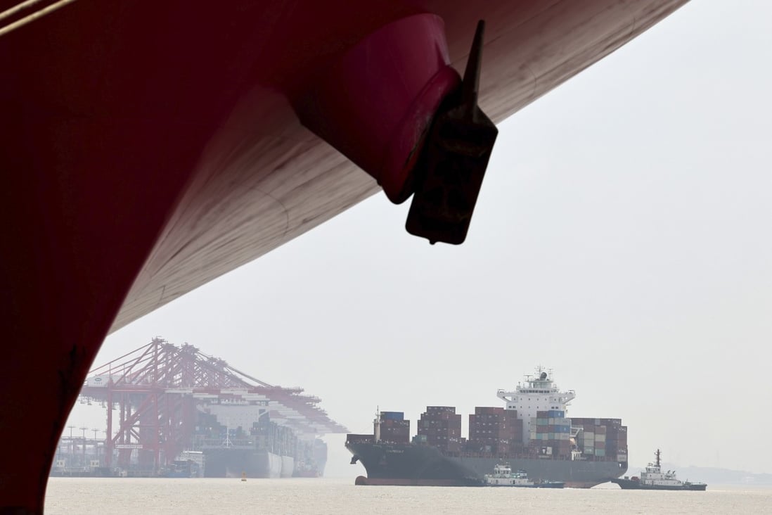 A container ship sails towards Shanghai’s Yangshan Port on April 27. China today can offer more than deep pockets in Asia’s economic development. Photo: Xinhua via AP