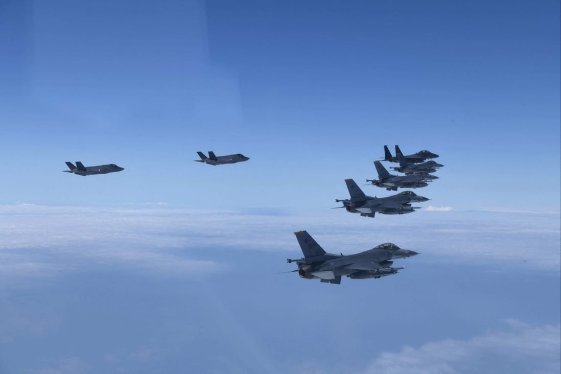 South Korean warplanes, including F-35 stealth fighters, and US F-16 jets flying in tactical formation in airspace over South Korea. Photo: AFP