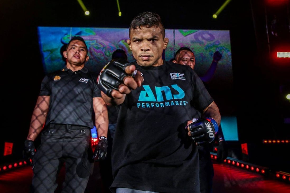 Bibiano Fernandes walks out to the ONE Circle for a bantamweight title fight with John Lineker. Photos: ONE Championship