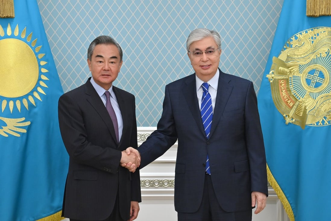 Chinese Foreign Minister Wang Yi (left) with Kazakh President Kassym-Jomart Tokayev, in Nur-Sultan on Tuesday. Photo: Handout
