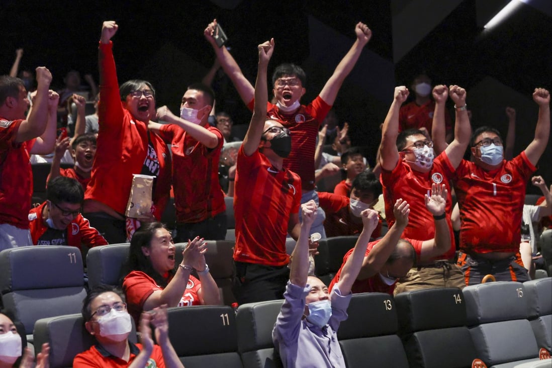 Hong Kong football fans cheer as they watch a game against Afghanistan at Emperor Cinema, Times Square. 
08JUN22     SCMP/Yik Yeung-man