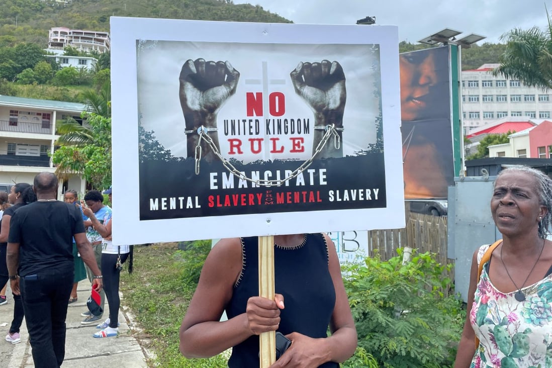 Activists rally outside the residence of Governor John Rankin in May calling for the British Virgin Islands to retain its autonomy. Photo: Reuters