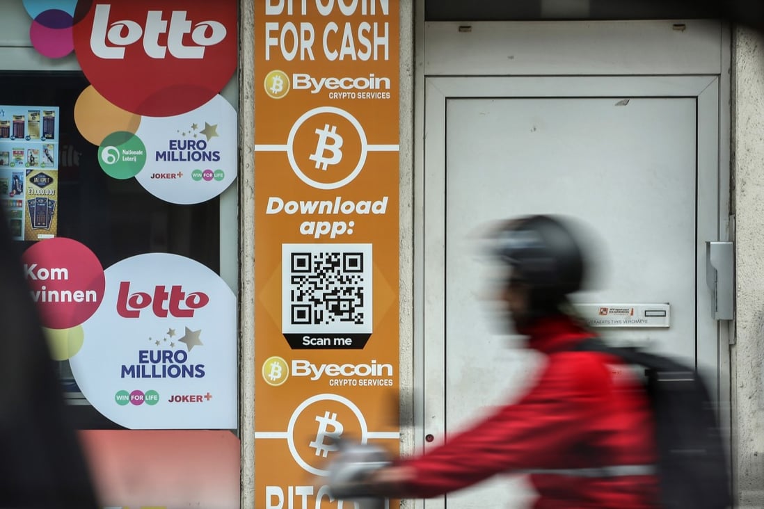 Bitcoin and the Byecoin app are advertised in the window of a store in Antwerp, Belgium. Despite ECB President Christine Lagarde’s view that cryptocurrencies are “worth nothing”, digital assets continue to hold considerable appeal for many. Photo: Bloomberg 