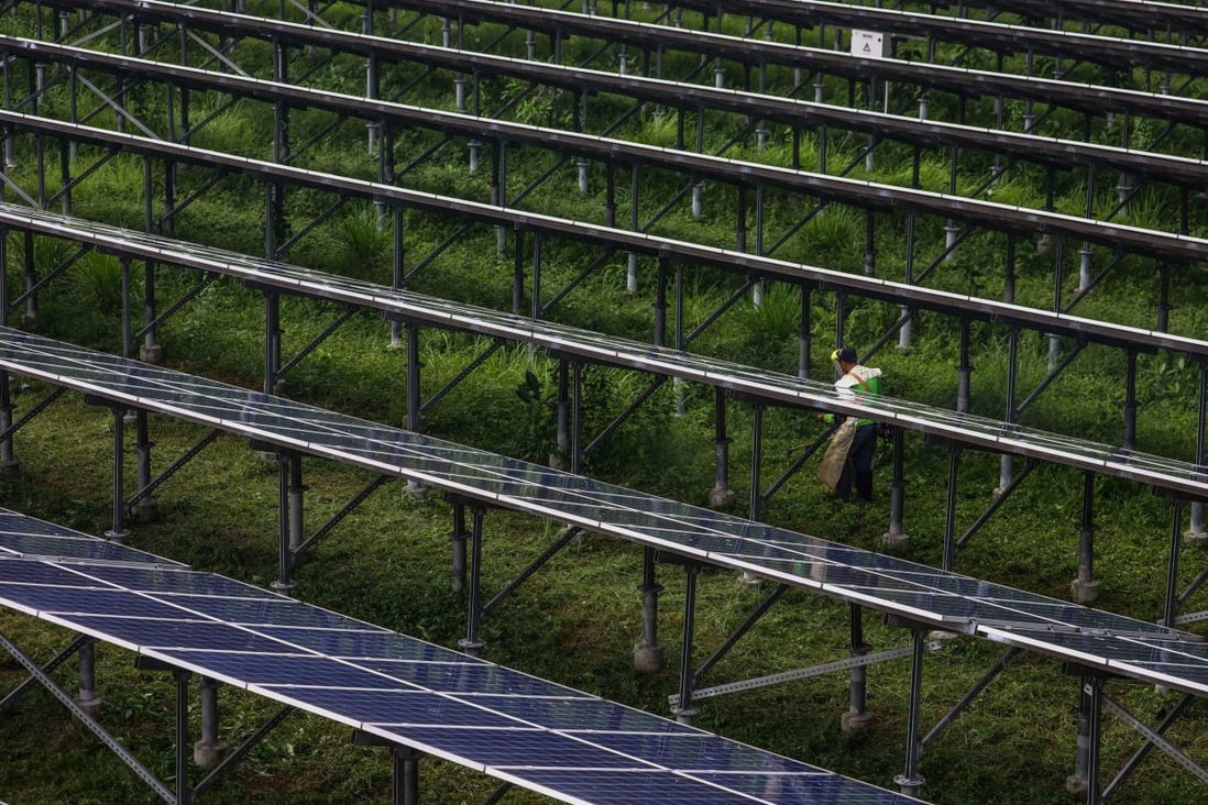 Enrique Razon will build a solar panel facility like this one in The Philippines. Photo: AFP