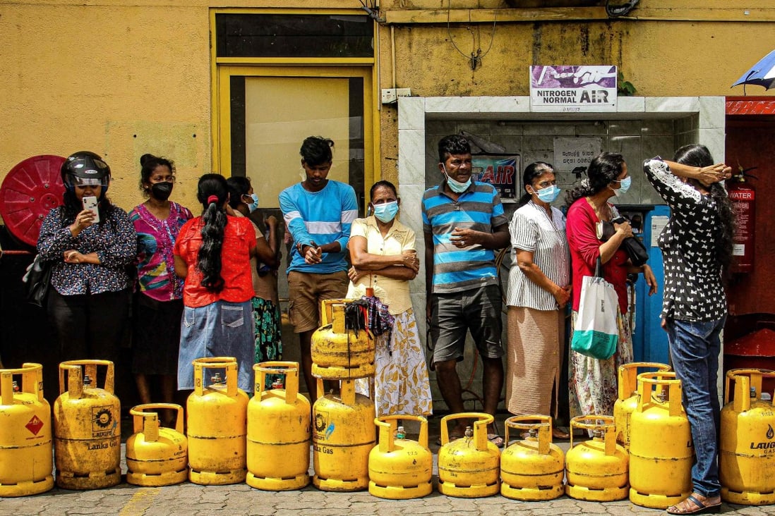 Queuing for gas in Colombo, Sri Lanka where a debt crisis is causing widespread shortages of basic items. Photo: AFP