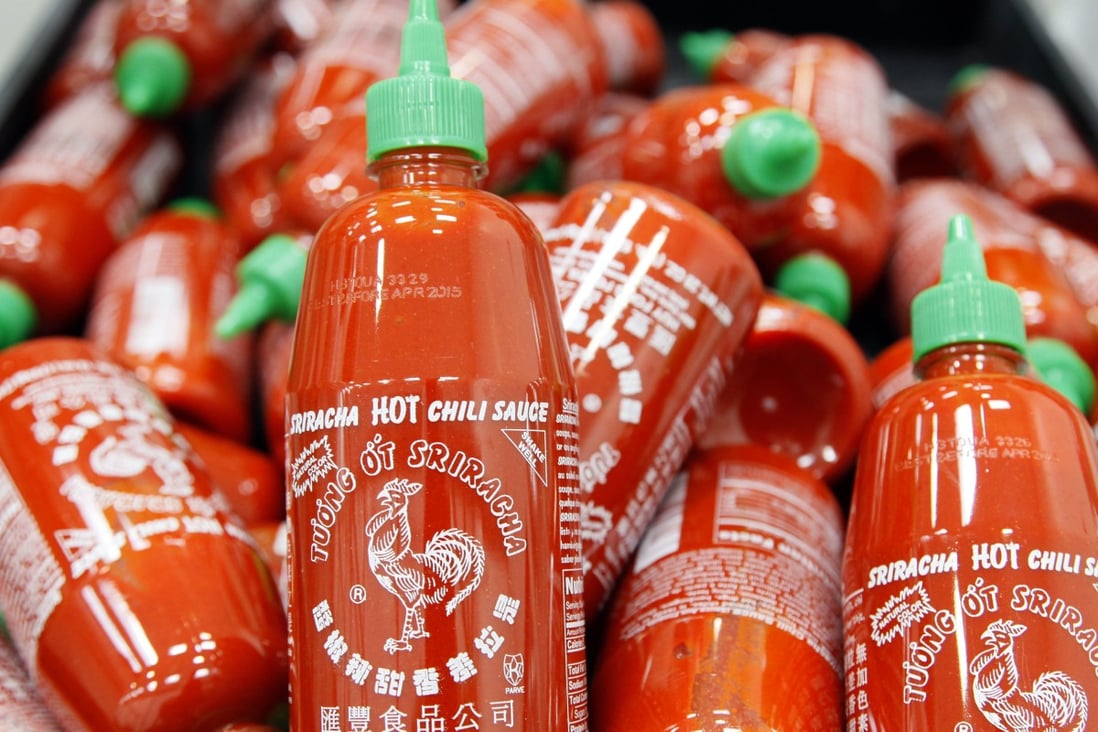Sriracha chili sauce bottles are produced at the Huy Fong Foods factory in Irwindale, California, in October 2013. Photo: AP
