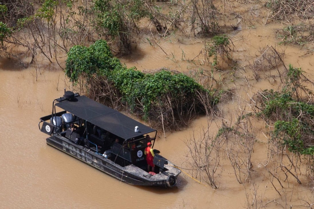 A police boat patrols an area of the municipality of Atalaia do Norte, in the state of Amazonas, Brazil on Friday in search of missing indigenist Bruno Pereira and journalist Dom Phillips. Photo: AFP