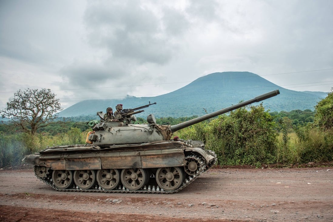 A Congolese army tank heads towards the front line near Kibumba in the area surrounding the North Kivu city of Goma. File photo: AFP

