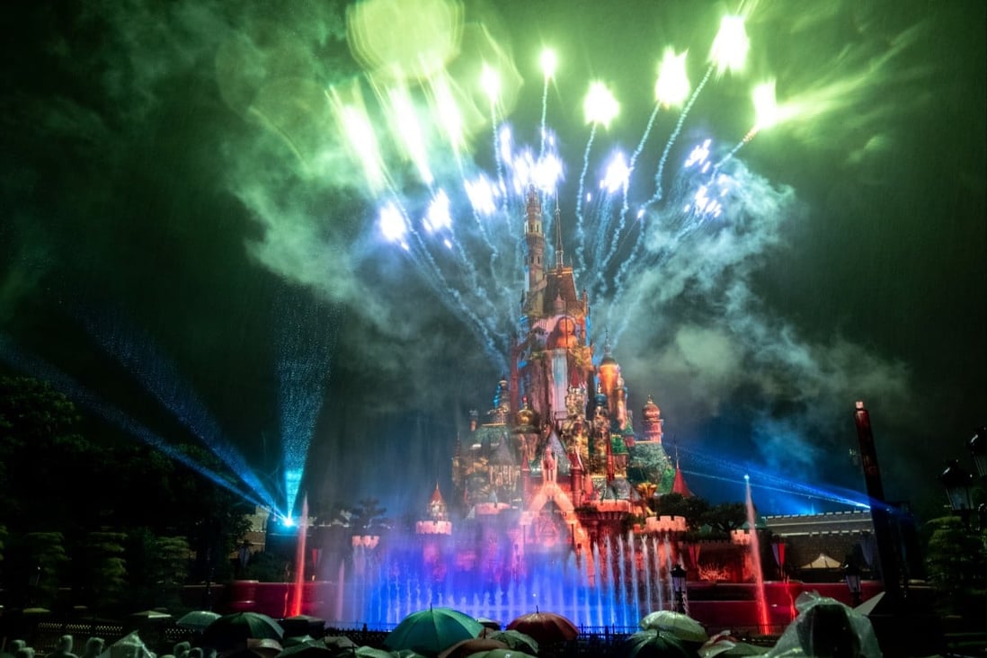 Hong Kong Disneyland debuts its new fireworks display, Momentous, which lights up the sky above the new Castle of Magical Dreams. Photo: Connor Mycroft 